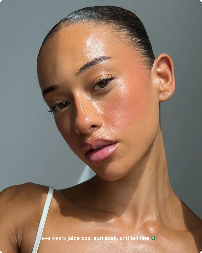 eve wears juice box, sun soak, and tan line