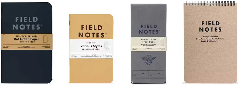 Four styles of Field Notes: Pitch Black Notebook, Original Kraft Memo Book, Front Page Reporters Notebook, and Steno Pad