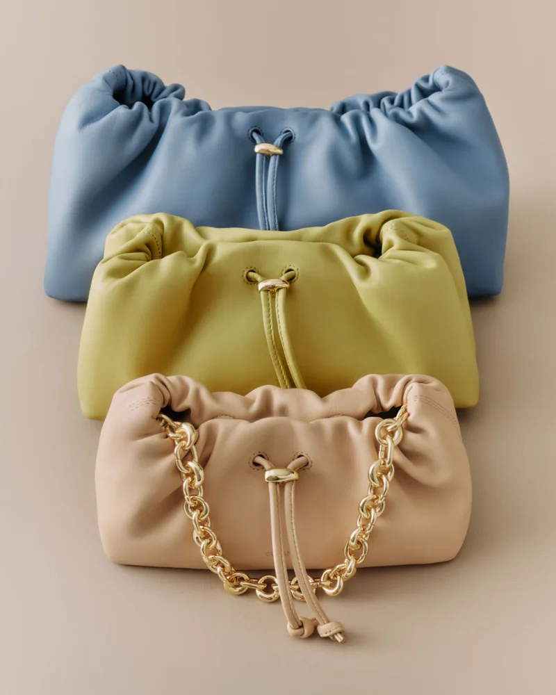 Dia Bag Collection: Dia in Azure, Mini Dia in Lime, and Nano Dia in Crema with gold chain strap.