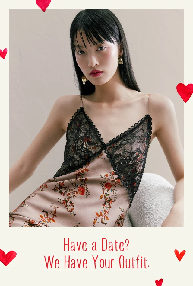Model wearing a silk and lace slipdress.