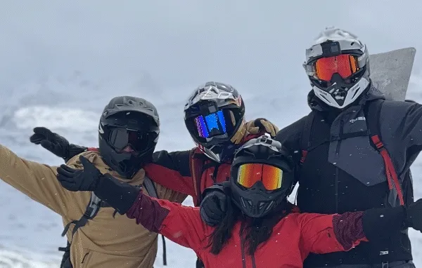 Group of riders, Lynx snowmobile