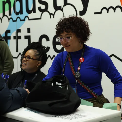 Two volunteers work at the 2025 Sundance Film Festival.