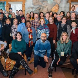 Fellows, advisors, and staff inside a lodgeat the 2023 January Screenwriters Lab.