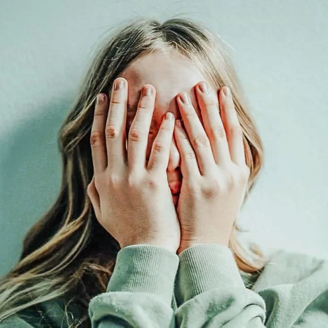 Why Are Gen Z Kids Covering Their Noses in Family Photos?