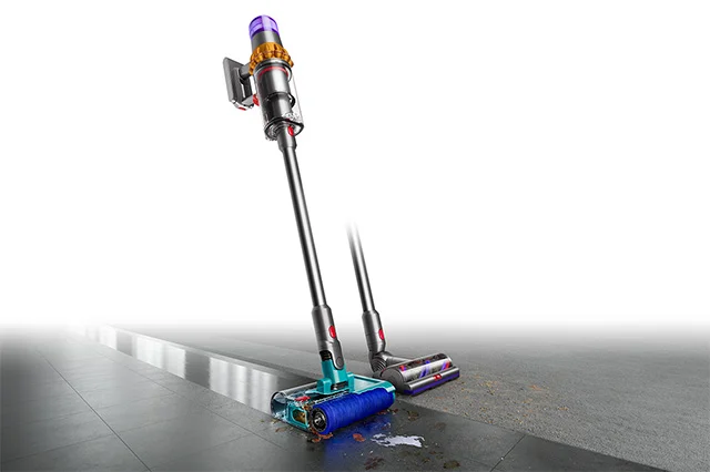 Dyson V15s Detect Submarine washing a hard floor while another cleaner head is shown cleaning carpet