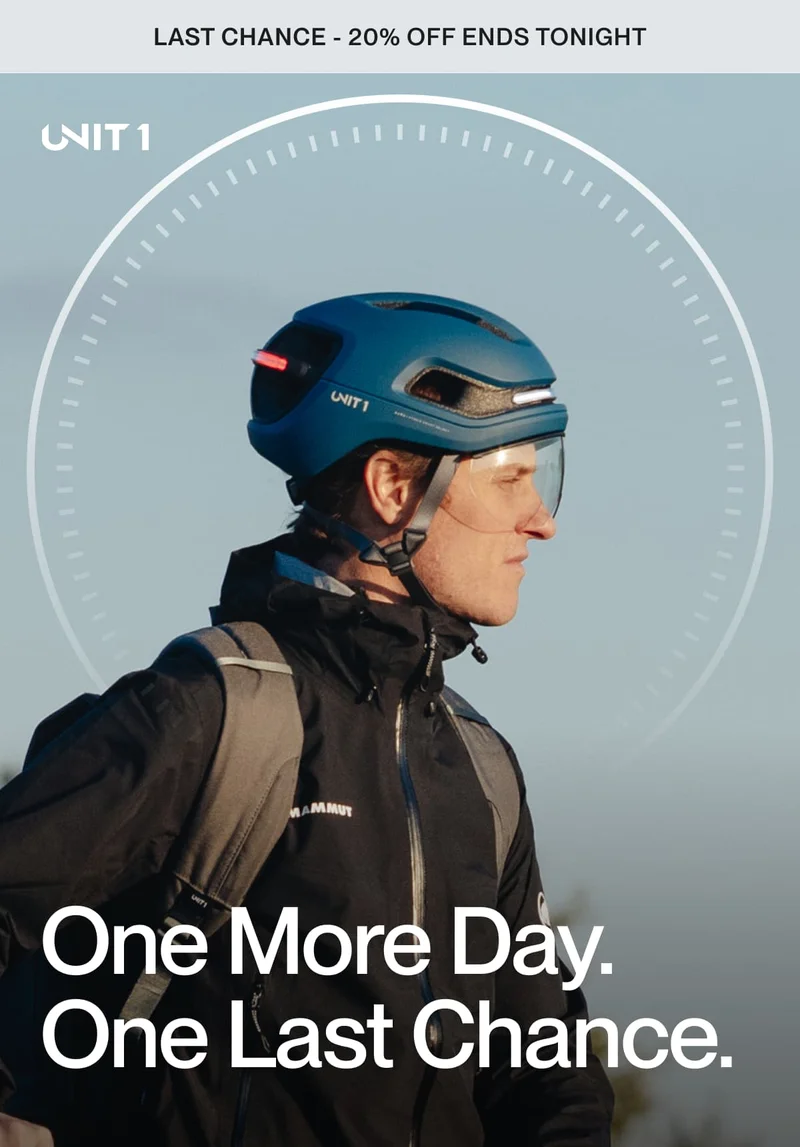 Rider wearing a UNIT 1 AURA helmet at golden hour, symbolizing the last day of the 20% off promotion.