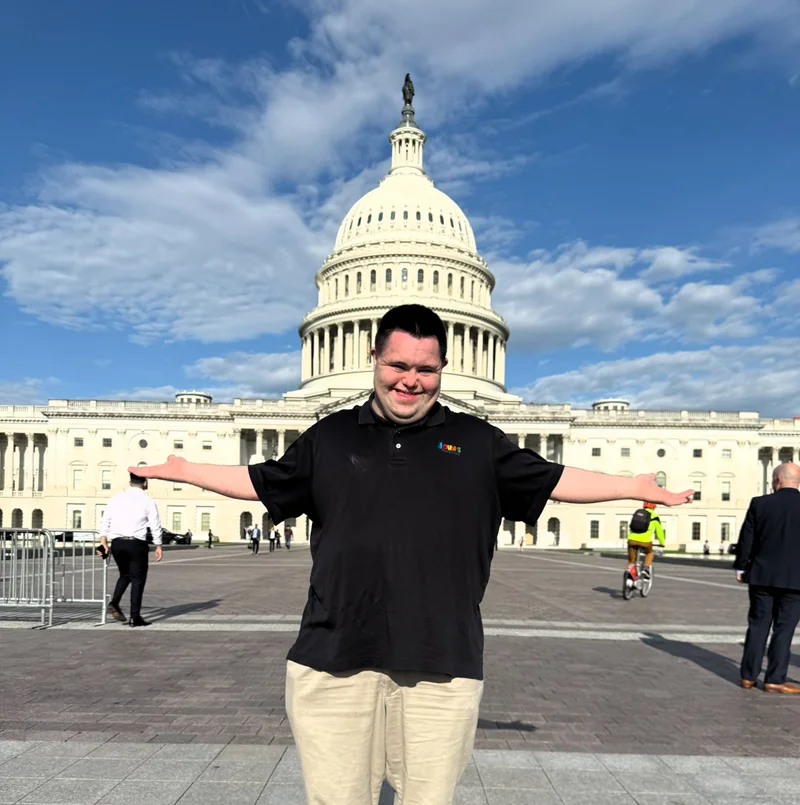 John in front of the U.S. capitol