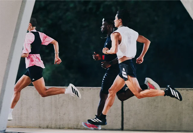 People running in Adizero Evo SL shoes
