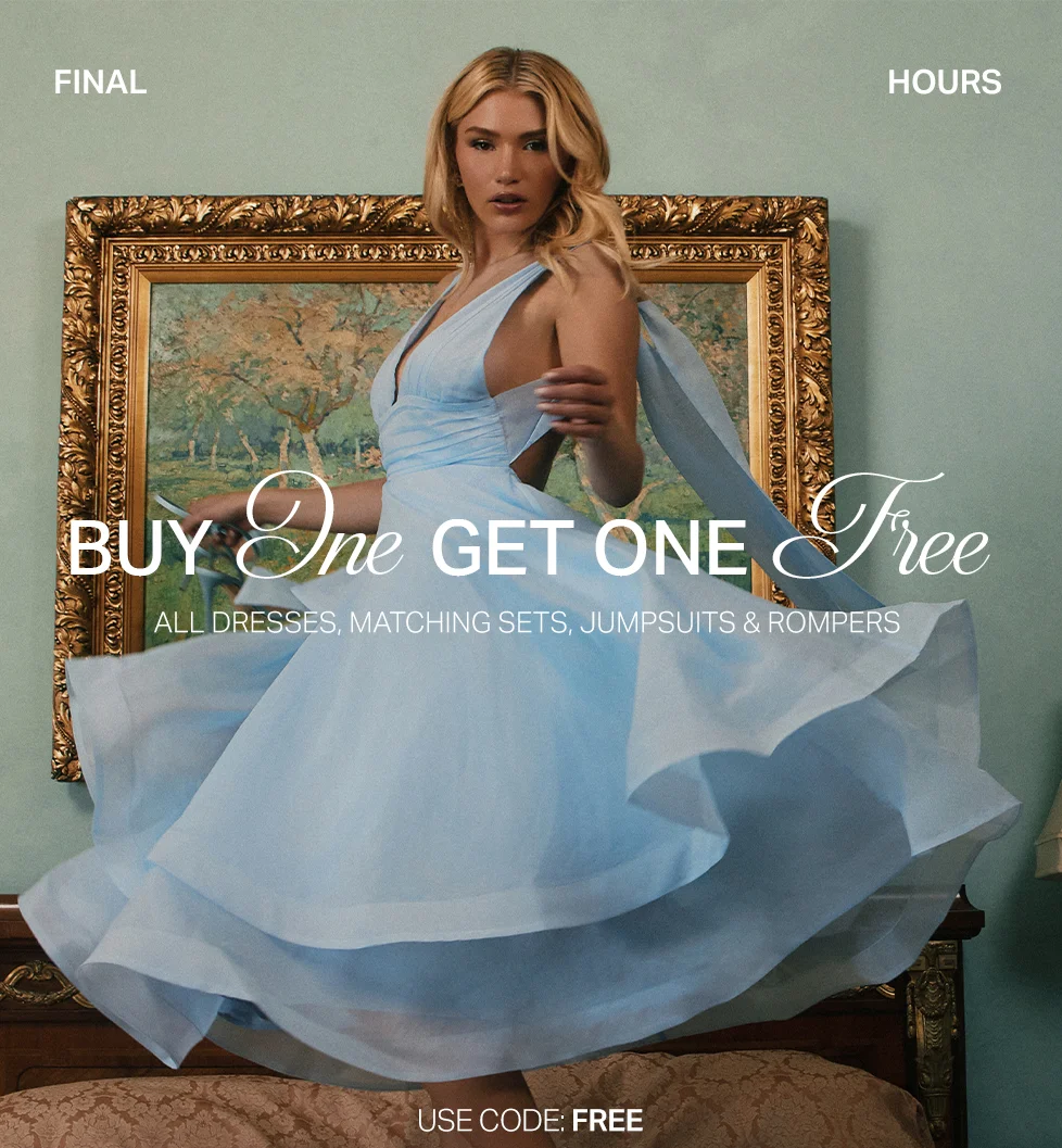 Woman in a flowing light blue dress promoting a BOGO Free sale on dresses, matching sets, jumpsuits, and rompers. Final hours!