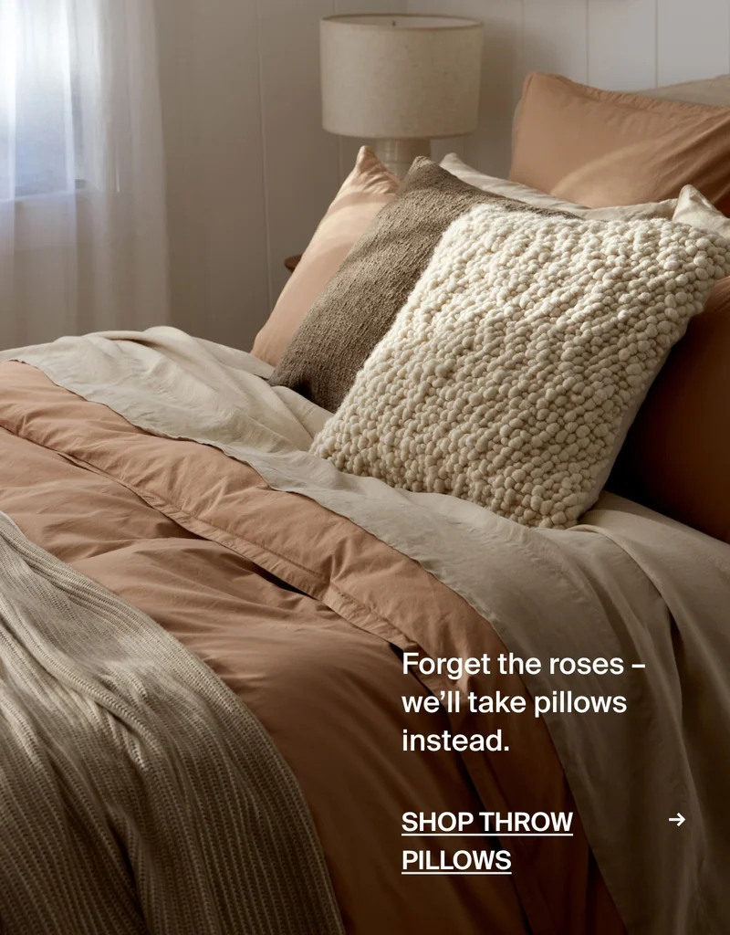 Forget roses, we'll teak pillows instead. Shop throw pillows.