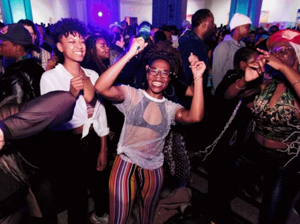 A GIF of the Brooklyn Museum and people dancing