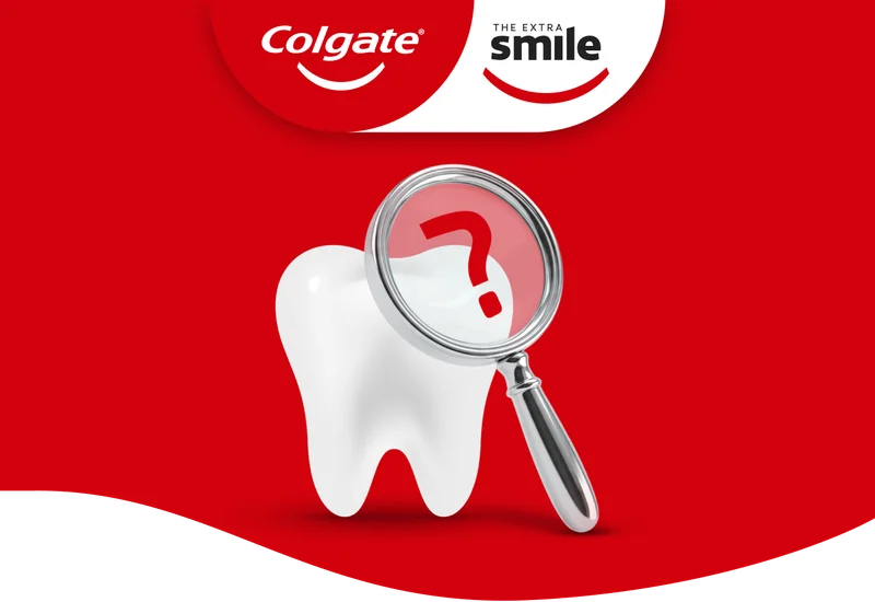 A tooth graphic on a bold red background, with a magnifying glass hovering above it containing a question mark.