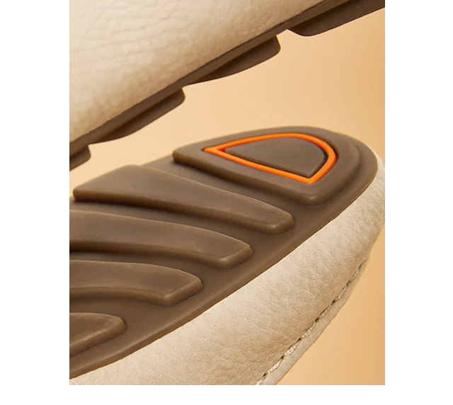 The flexible driving sole on the women's Ozzie Loafer in Taupe. Shop Loafers.