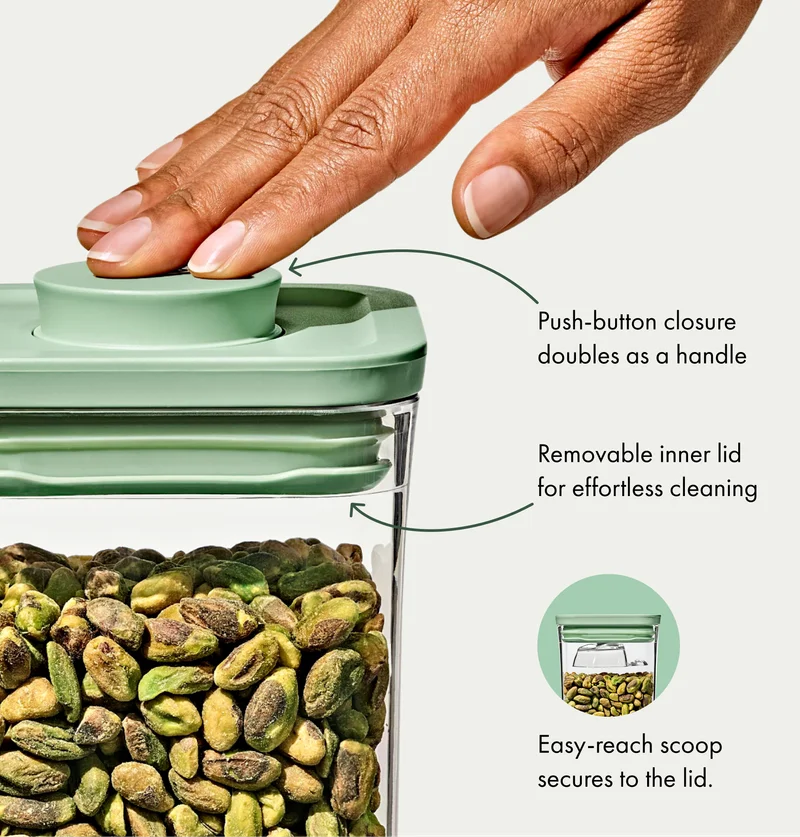 Push button closure doubles as handle. Removable inner lid for effortless cleaning.