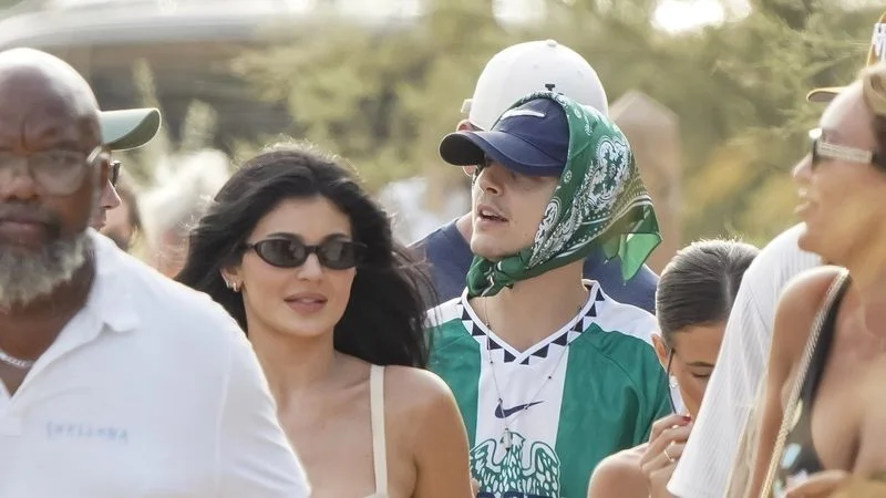 Kylie Jenner and Timothée Chalamet were all smiles as they stepped out for a sun-soaked day at Pampelonne Beach — with Kylie turning heads in a striped bodycon dress and Timmy rocking a Nigeria jersey and scarf. But the glam getaway took a wrong turn when their driver reportedly snagged a disabled parking spot, drawing attention for all the wrong reasons.