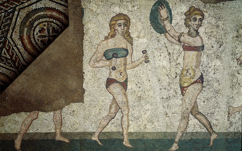 Roman women in a fourth-century A.D. mosaic from Sicily compete in an athletic contest while wearing an amictorium, a bandeau-type linen garment that bound the breasts.