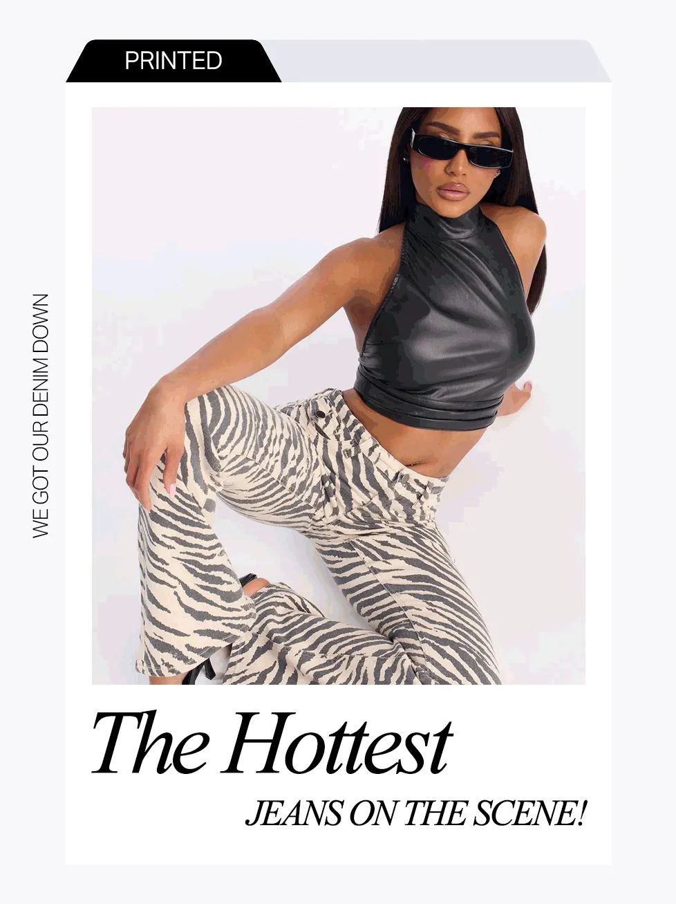Model wearing black halter crop top and trendy beige zebra print flared jeans, promoting our hottest printed denim jeans.