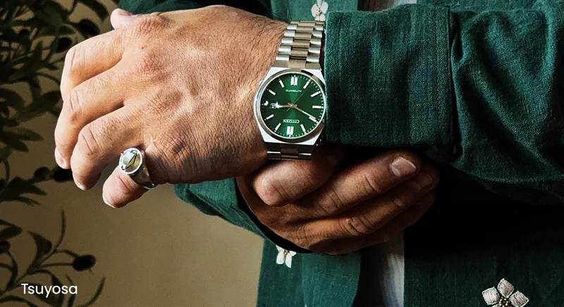 Person wearing the green dial Tsuyosa