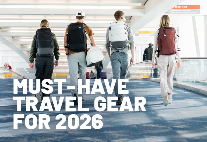 4 people walking in airport with text "Must-Have travel gear for 2026