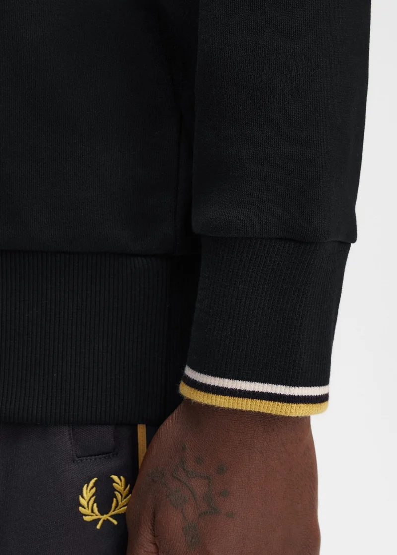 Close up of a Fred Perry Twin Tipped Navy and Honeycomb Sweatshirt