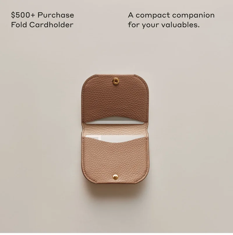 $500+ Purchase Fold Cardholder A compact companion for your valuables.