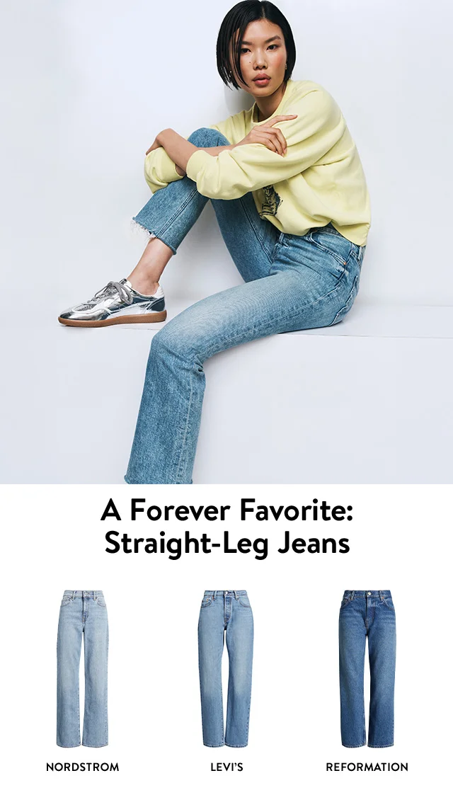 A woman wearing straight-leg jeans with a graphic sweatshirt and metallic sneakers. Straight-leg jeans. Straight-leg jeans.  Straight-leg jeans.
