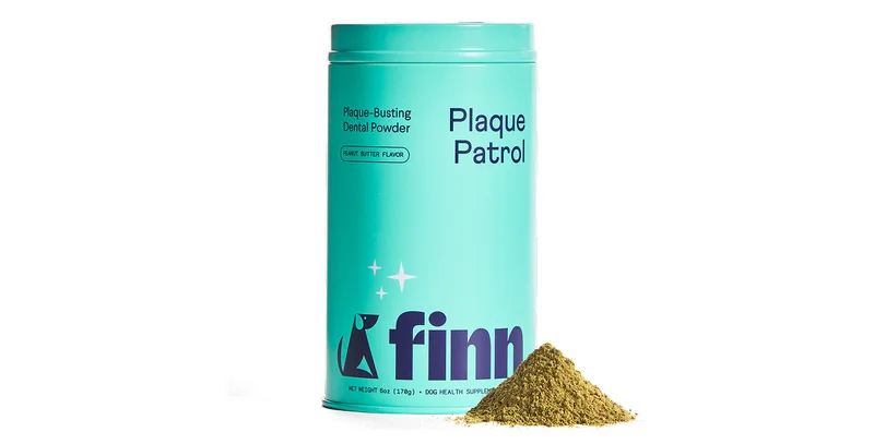 Image of Plaque Patrol tin with a pile of powder next to it