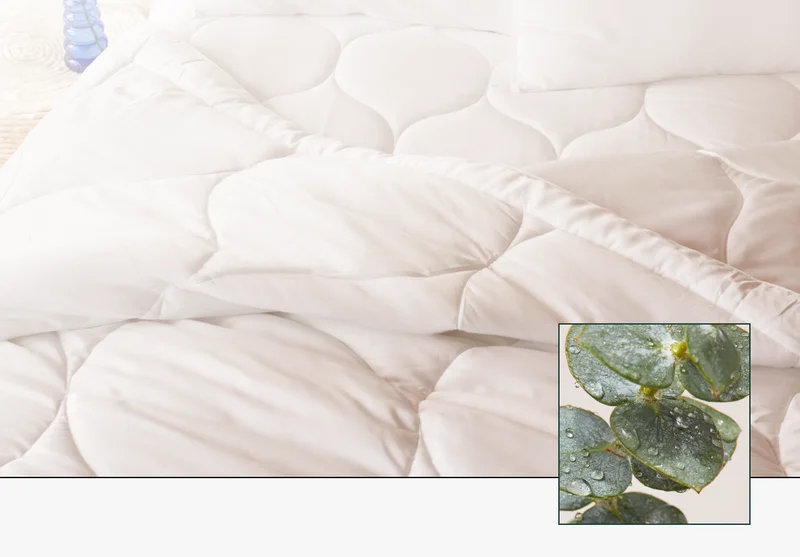 Its outer cover is made of Tencel lyocell which is a material that is sustainably sourced, super light and isn't crinkly or loud.