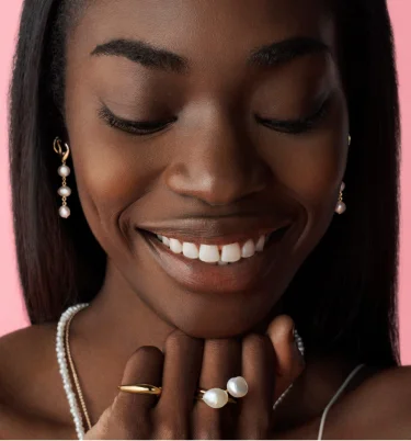 Model wears PANDORA ESSENCE