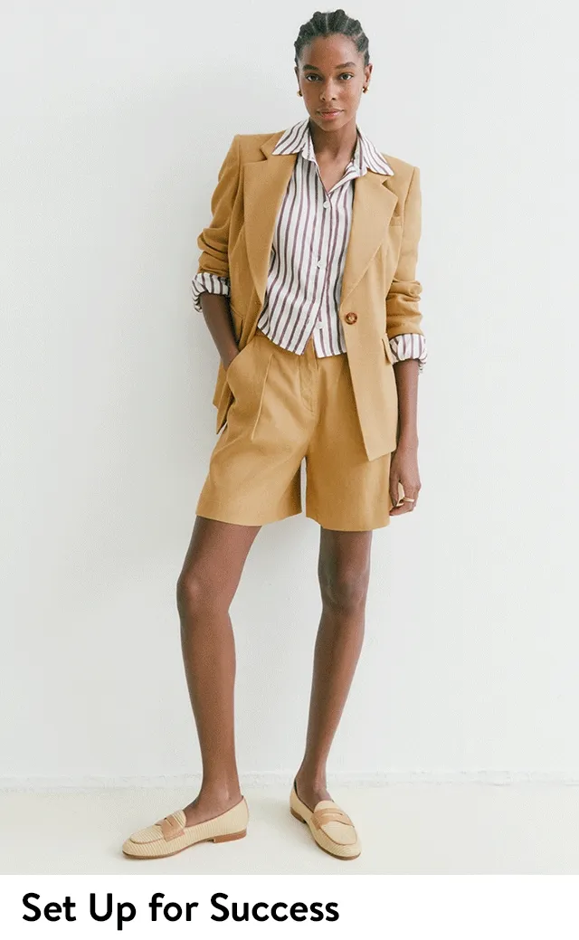 A woman wearing matching suit separates.