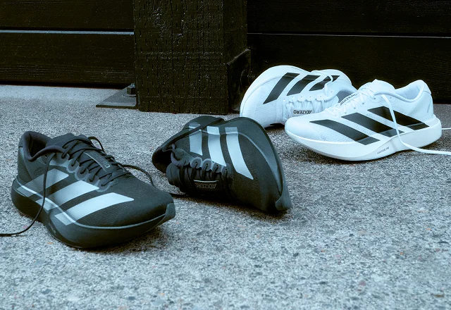 Two pairs of adidas Adizero EVO SL running shoes