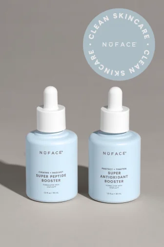 Super Peptide Booster and Super Antioxidant Booster in light blue packaging in front of taupe background