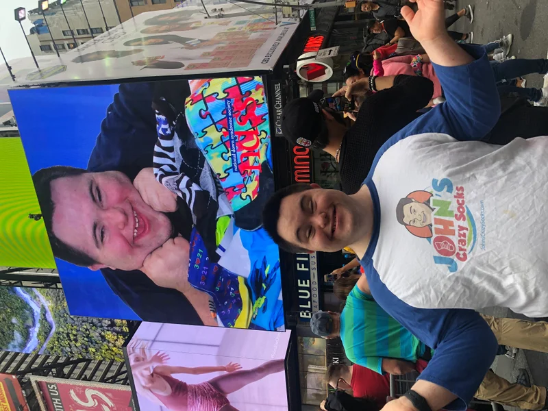 John on a Times Square billboard