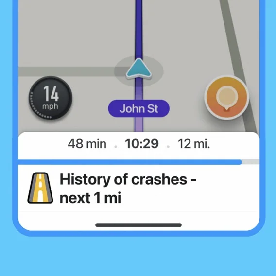 Waze app on a phone showing a crash alert