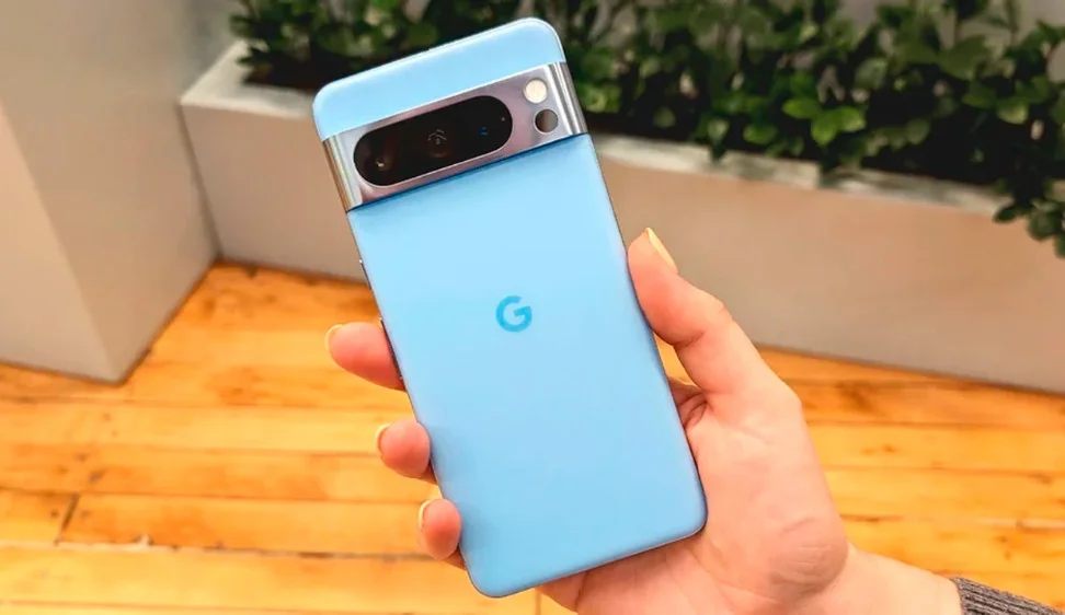 A hand holding a Pixel 8 Pro