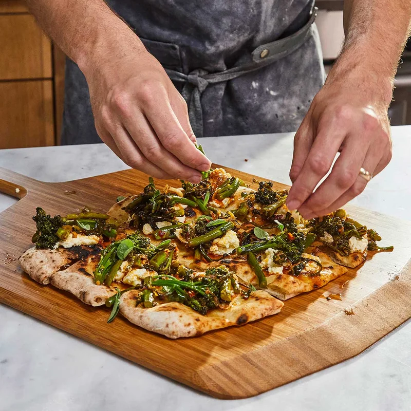 Pizza Crostini with Ricotta and Marinated Broccolini