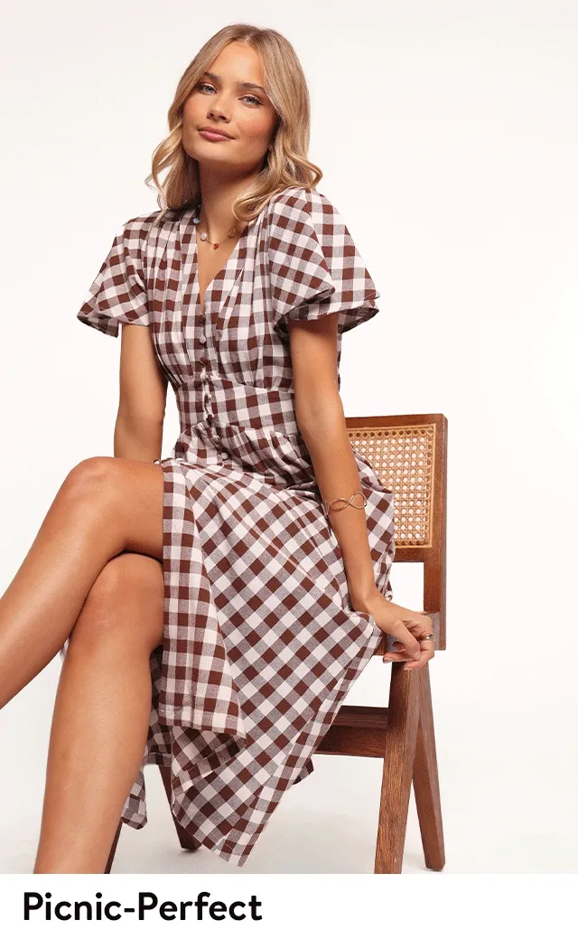 Women wearing gingham dresses.