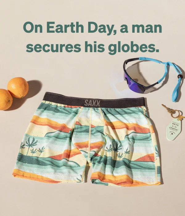On Earth Day, a man secures his globes.
