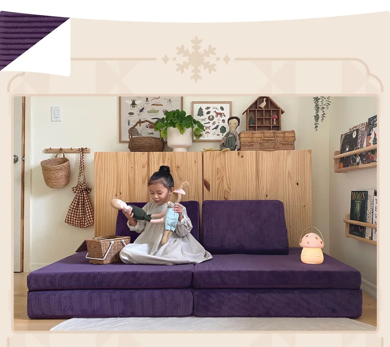 A child plays with dolls on the newest Nugget, Sugarplum!