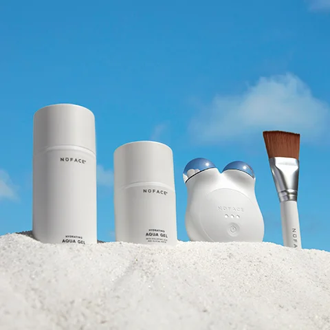 MINI+ Smart Device Holiday Kit Limited Edition showcased on the sand.