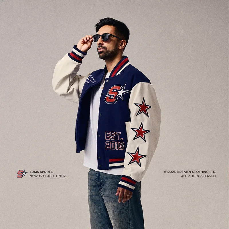 Vik wearing the All-Star Varsity Jacket