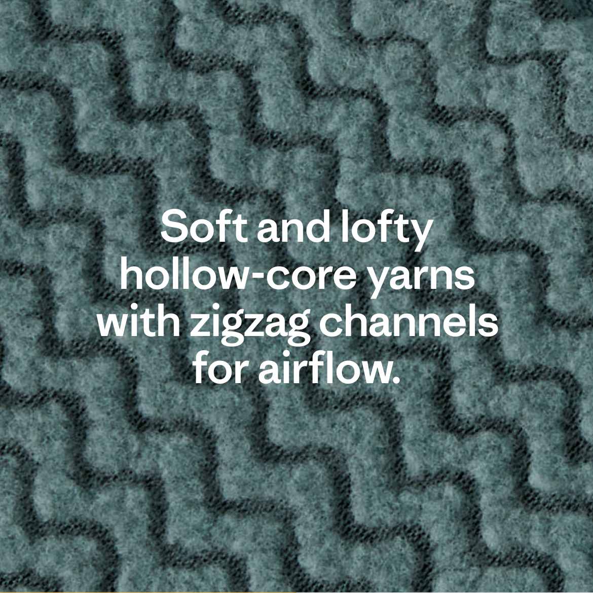 Soft and lofty hollow-core yarns with zigzag channels for airflow.