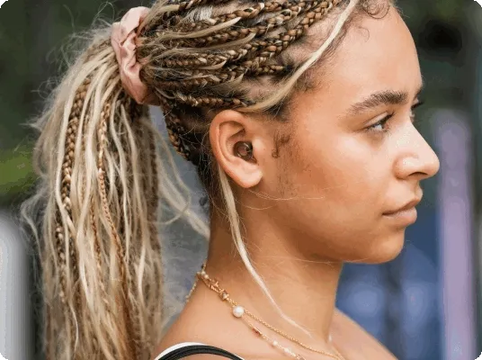 Young girl wearing loop experience in silver