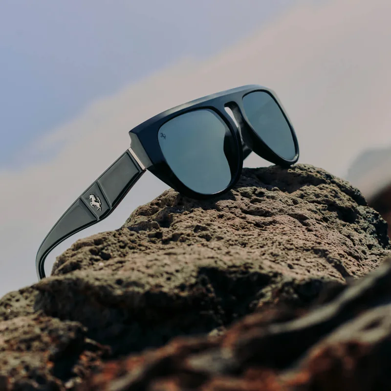 Black acetate Ferrari sunglasses with sculptural effects and polarised mirrored lenses