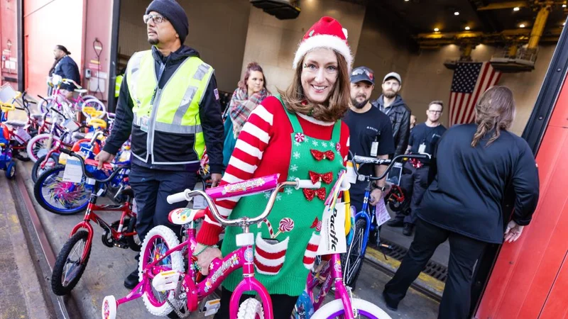 Delta people assemble bikes for Toys for Tots