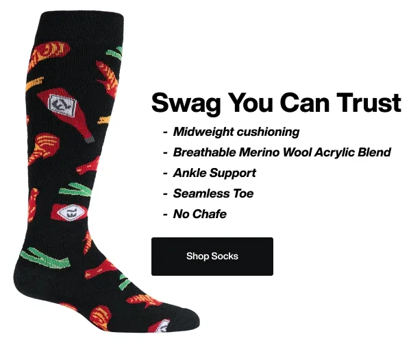 Animated GIF cycling through five Burton novelty knee-high socks: an orca and mountain landscape, a peanut butter jar with a cobra, a grape jelly jar with a purple cartoon character, a hot chips pattern on black, and a red buffalo plaid with a bearded lumberjack. Text reads "Swag You Can Trust" with features listed: midweight cushioning, breathable Merino Wool Acrylic Blend, ankle support, seamless toe, no chafe. Includes a "Shop Socks" button.