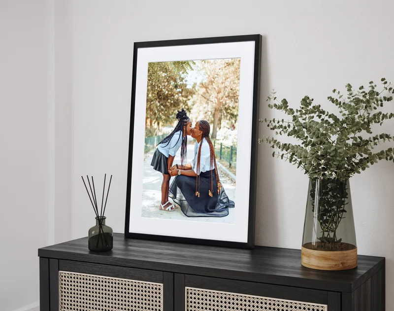 Framed print of mother and daughter.