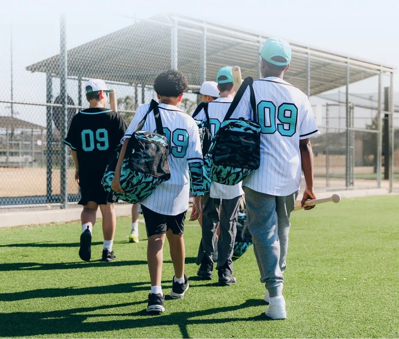 Kids wearing DP Baseball Jerseys on the field