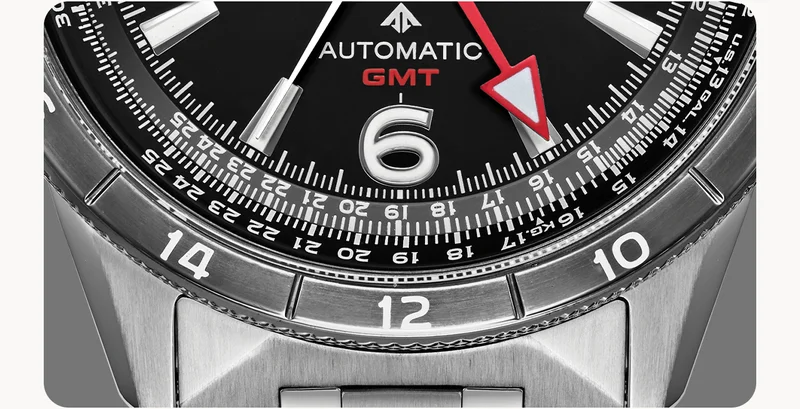A close-up shot reveals the aeronautical slide rule on the inner bezel, and 24-hour notation on the outer bezel.
