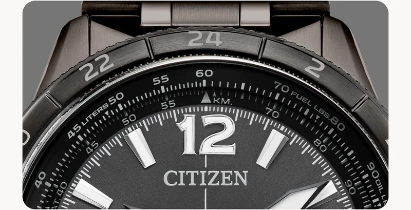 A close-up shot reveals the aeronautical slide rule on the inner bezel, and 24-hour notation on the outer bezel.